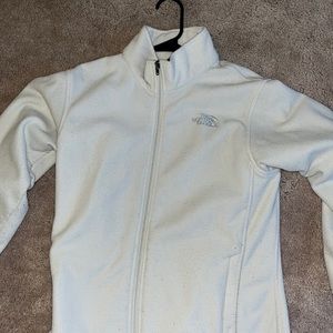 North face white fleece. Children size large, but fits small women.